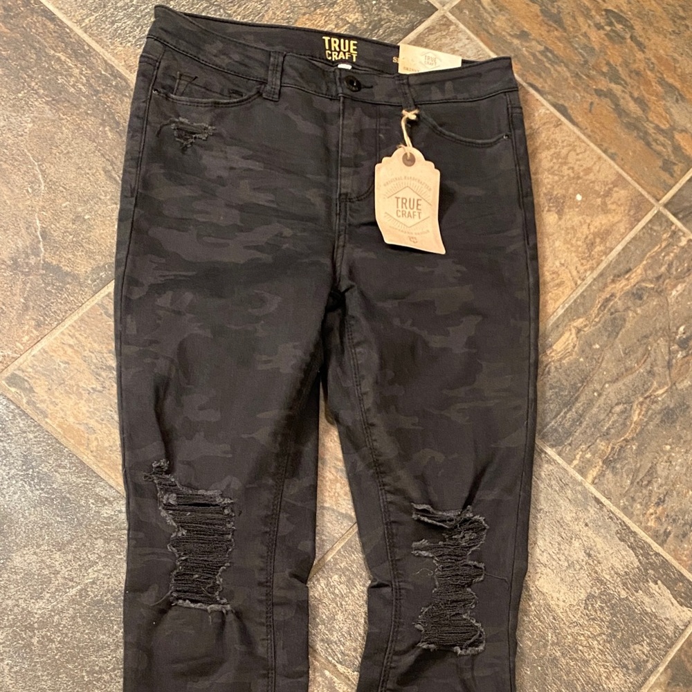 Black camo skinny jeans